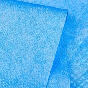 Beyond the Barrier: How Laminated Nonwovens Solve the Comfort-Durability Paradox in Surgical Gowns & Isolation Apparel